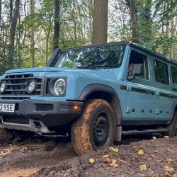 INEOS Grenadier driving over rough terrain.